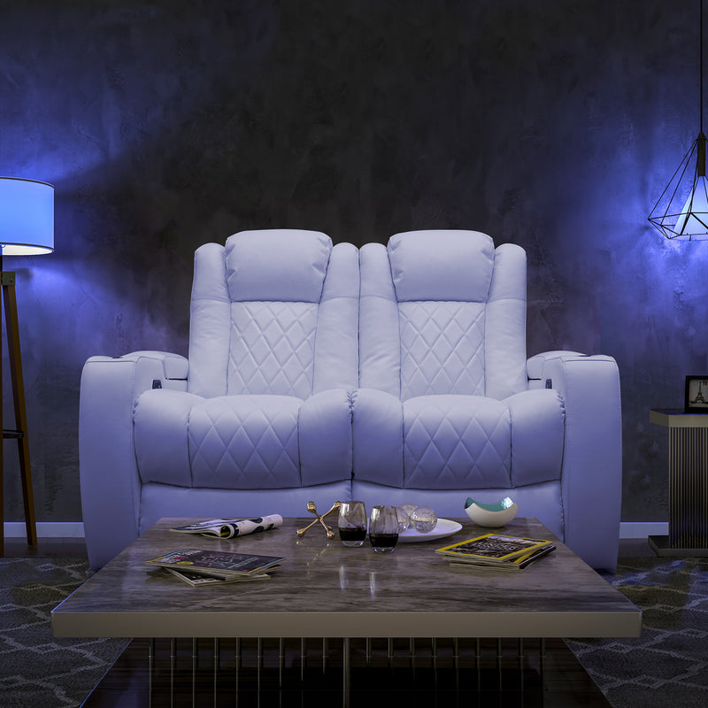 A custom Valencia Tuscany home theater loveseat in an all white color and in a living room with blue lighting